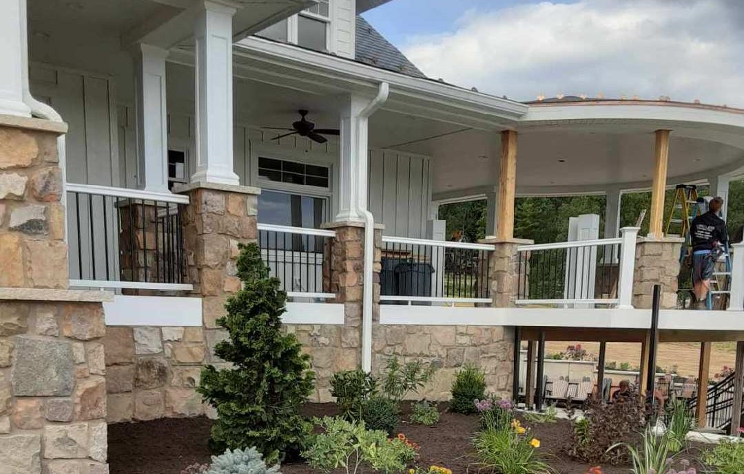 Two-level porch with stone columns